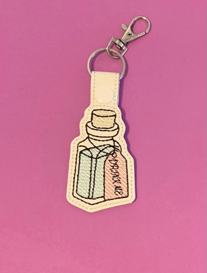 Drink me keychain