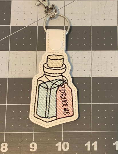 Drink me keychain