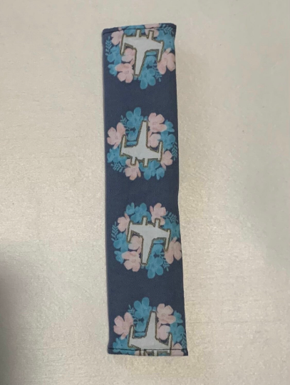 Floral fighter seatbelt cover