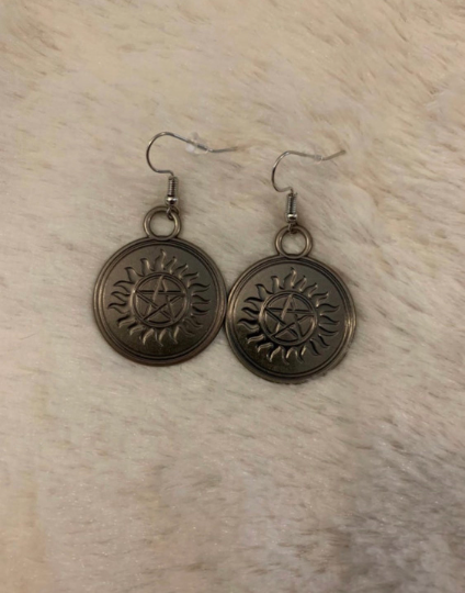 Anti-possession earrings