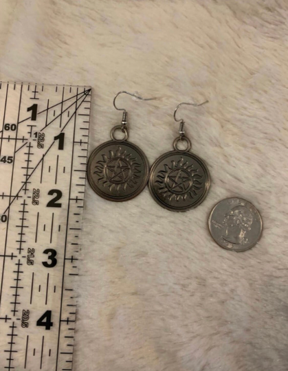 Anti-possession earrings