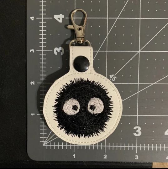 Dust spirit keychain